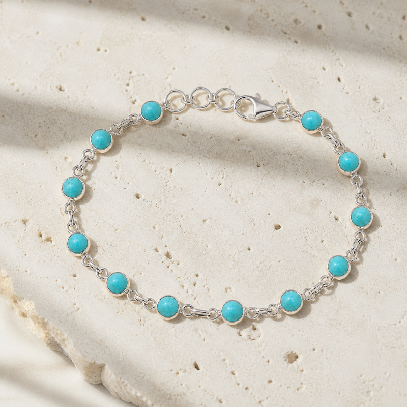 Zilveren armband met rond geslepen in kap gezette edelsteen - 925 zilver - 5 mm · Turkoois · sfeerbeeld · steen:turkoois