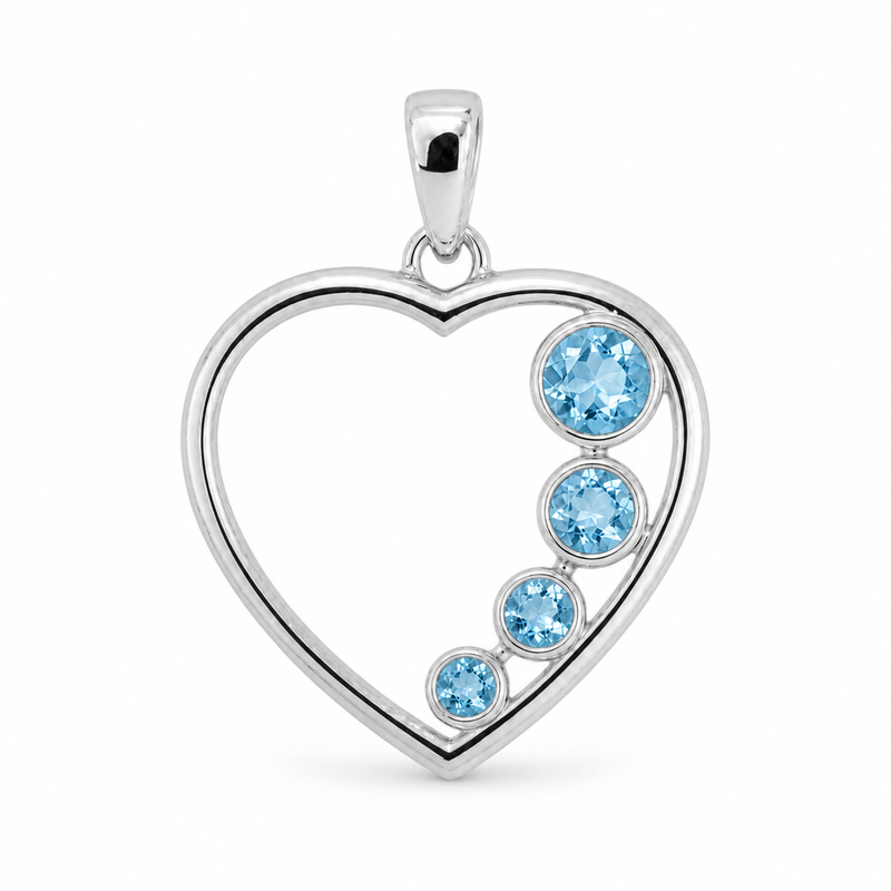 Zilveren hart hanger met rond gefacetteerde edelsteen - 925 zilver - 23 x 21 mm · Blauwe Topaas · detail · steen:blauwe-topaas