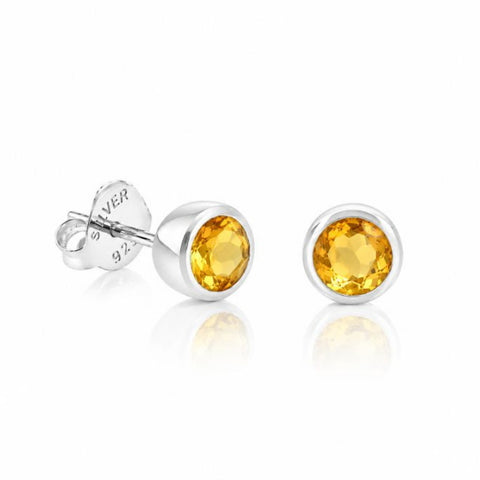Zilveren oorknopjes met rond gefacetteerde edelstenen - 925 zilver - 5 mm · Citrien