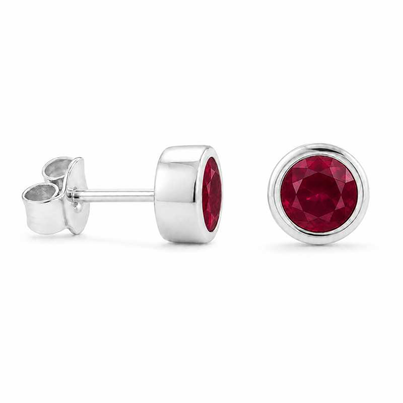 Zilveren oorknopjes met rond glad in kap gezette edelsteen, gefacetteerd - 925 zilver - 3 mm · Toermalijn · productfoto · steen:toermalijn