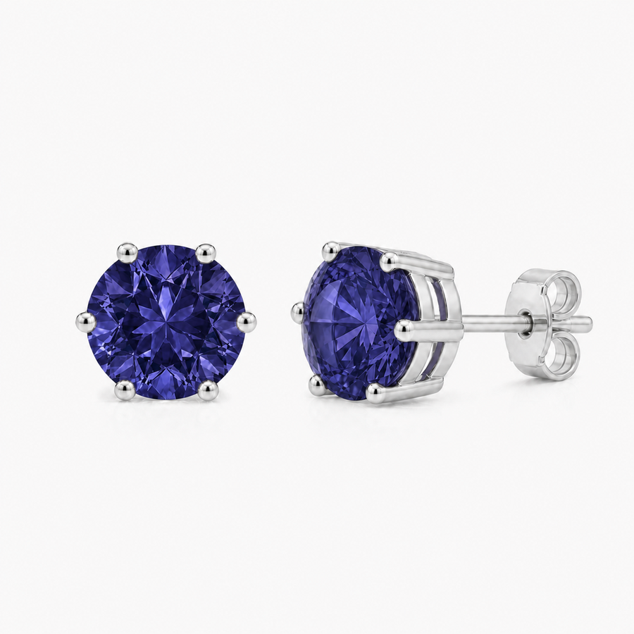 Zilveren oorknopjes met rond gefacetteerde in klauw gezette edelsteen - 925 zilver - 7 mm · Ioliet · productfoto · steen:ioliet