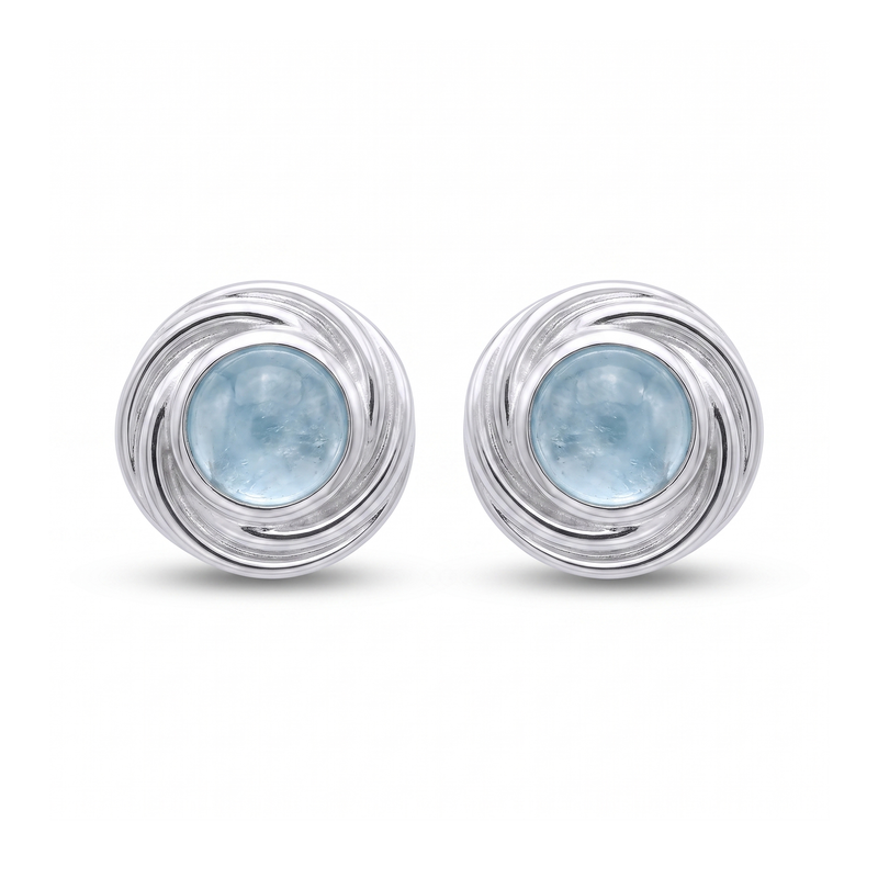 Zilveren oorknopjes met spiraalvormig gezette rond gefacetteerde edelstenen · Chalcedoon · studiofoto · steen:chalcedoon