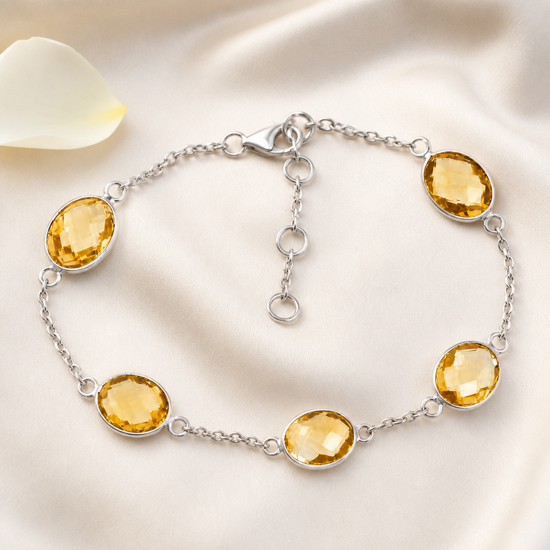 Zilveren armband met ovaal gefacetteerd in kap gezette edelsteen - 925 zilver · Citrien · sfeerbeeld · steen:citrien