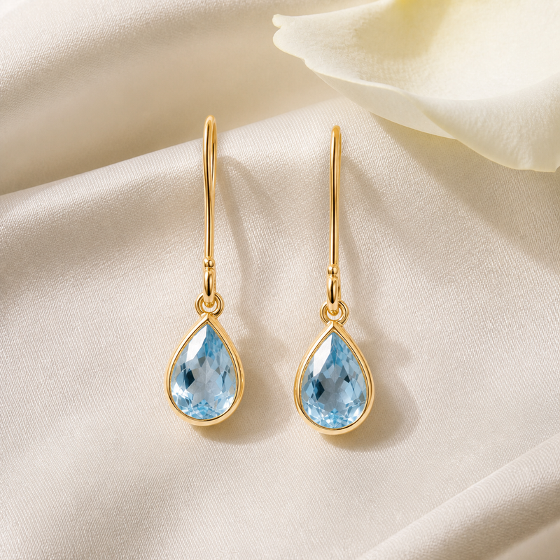 Gouden oorhangers met Labradoriet edelstenen · Blauwe Topaas · sfeerbeeld · steen:blauwe-topaas
