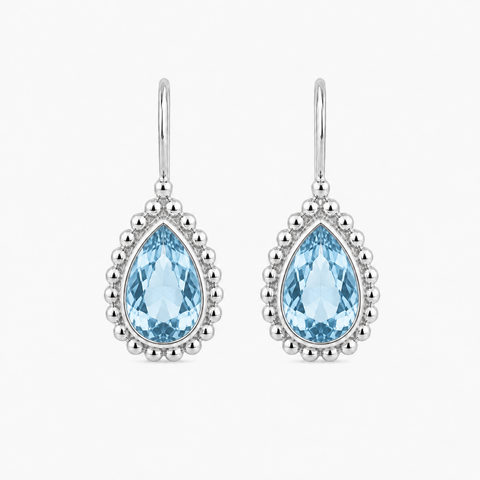 Zilveren oorhangers met druppelvormig in kap gezette edelsteen, gefacetteerd - 925 zilver - 9 x 7 mm · Blauwe Topaas