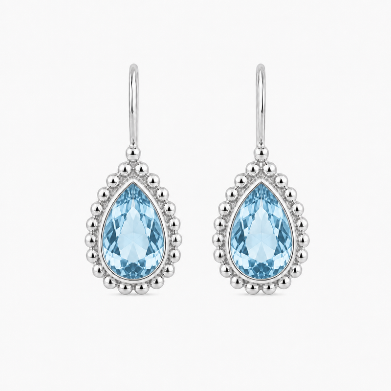 Zilveren oorhangers met druppelvormig in kap gezette edelsteen, gefacetteerd - 925 zilver - 9 x 7 mm · Blauwe Topaas · productfoto · steen:blauwe-topaas