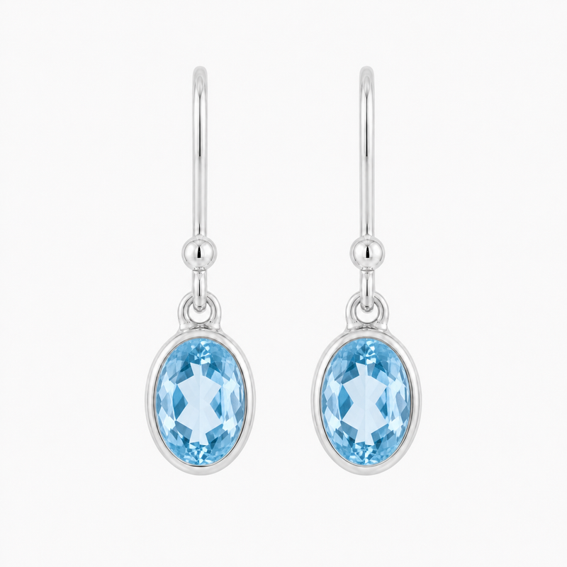 Zilveren oorhangers met ovaal in kap gezette edelsteen - 925 zilver - 22 x 6 mm · Blauwe Topaas · productfoto · steen:blauwe-topaas