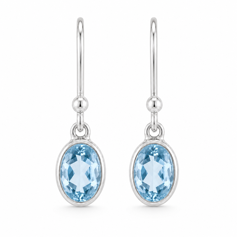 Zilveren oorhangers met ovaal in kap gezette edelsteen - 925 zilver - 22 x 6 mm · Blauwe Topaas · detail · steen:blauwe-topaas