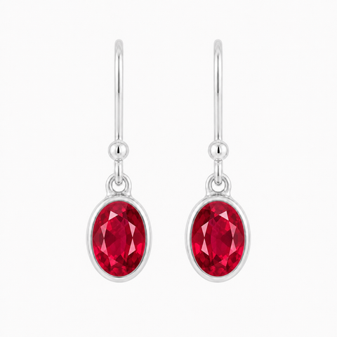 Zilveren oorhangers met ovaal in kap gezette edelsteen - 925 zilver - 22 x 6 mm · Robijn