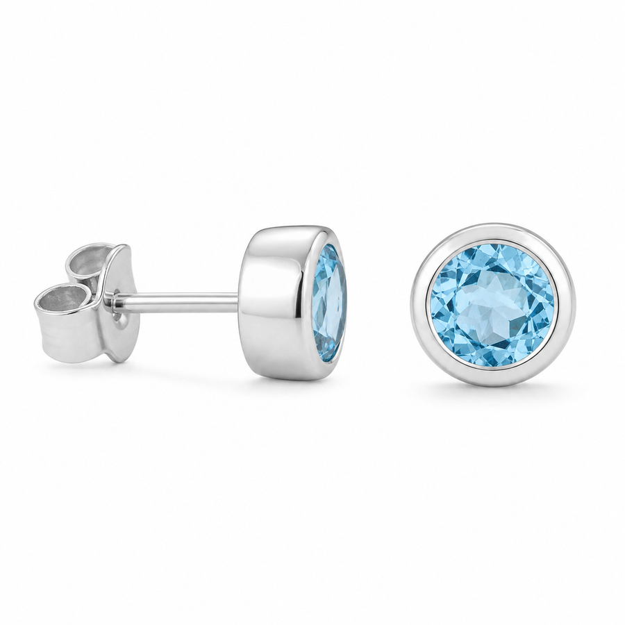 Zilveren oorknopjes met rond gefacetteerde kapgezette edelsteen - 925 zilver - 5 mm · Blauwe Topaas · productfoto · steen:blauwe-topaas