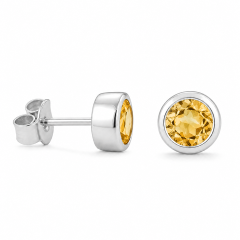 Zilveren oorknopjes met rond gefacetteerde kapgezette edelsteen - 925 zilver - 5 mm · Citrien