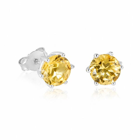 Zilveren oorknopjes met rond gefacetteerde chaton gezette edelstenen - 925 zilver - 7 mm · Citrien